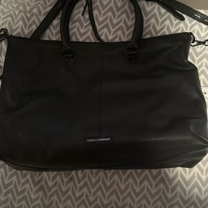 Rebecca Miinkoff. Purse good condition will fit a computer. 1 zip pocket inside